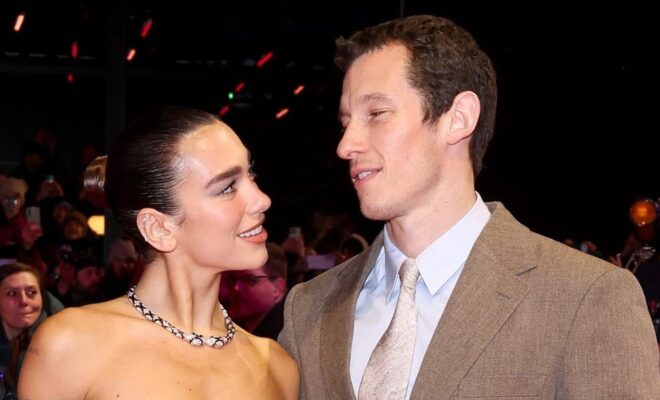 Dua Lipa e Callum Turner ph ig